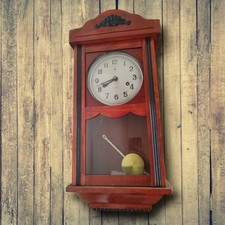 Orologio a pendolo a parete in