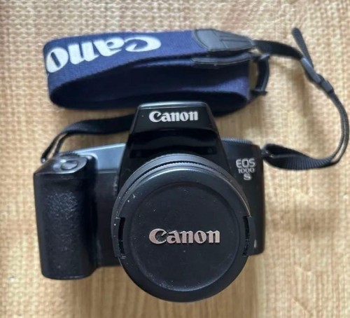 Canon eos 1000s console - canon,