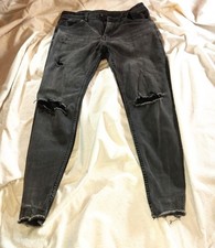 jeans uomo strappati