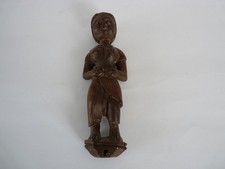 Statuetta in legno intagliato