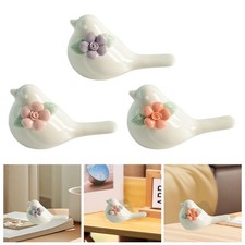 Statua di uccello in ceramica