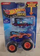 Camion Hot Wheels Monster Trucks SCORPEDO 2023 con auto DIE-CAST nuovo con scatola
