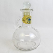 Empty Clear Glass Bottle Of