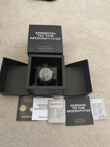 Omega swatch nero - x,