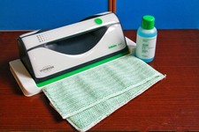 Lavavetri Folletto VG100 +  2 Panni In Microfibra + Liquido Lavavetro