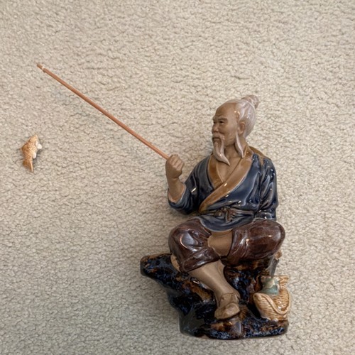 Statuina pescatore cinese - , in
