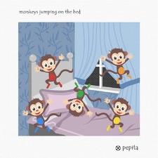 Scimmie che saltano sul letto