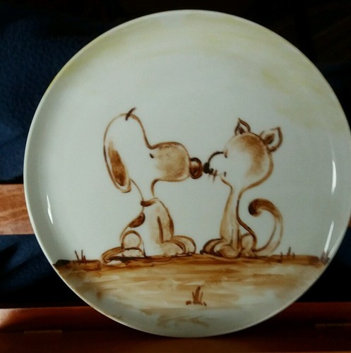 Snoopy gatto su - il,