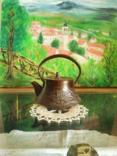 Antica teiera in ghisa Nambu