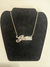 Guess Silver Tone Spell Out