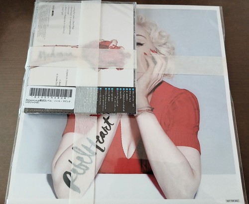 Sealed madonna rebel - -,