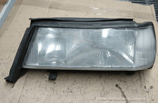 82436583 Proiettore SX LANCIA THEMA 2.0 16V LS S.W. 5p/b/1995cc.