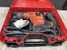 Trapano a percussione rotativo