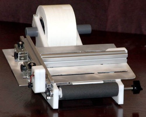 Etichettatrice per bottiglie - etichettatrice,