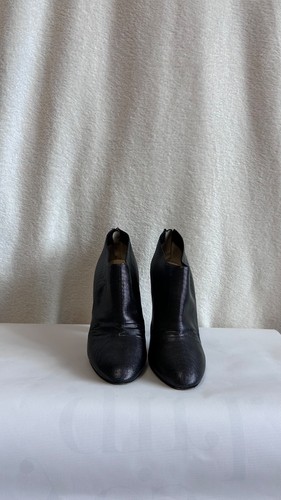 Snakeskin high heel shoe boots