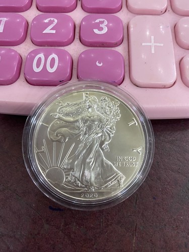 Dollaro argento oz - 1,