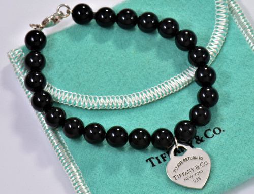 Bracciale please return - please, to