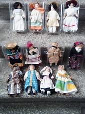 LOTTO 12 BAMBOLE ETNICHE DEL MONDO IN PORCELLANA - FABBRI EDITORE- VINTAGE