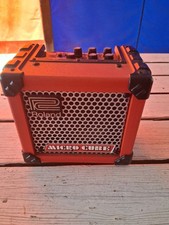 The item shown is a red Roland