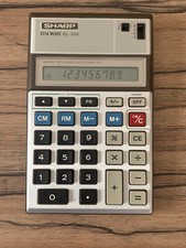 Calculatrice Sharp Elsi mate EL-308 , fonctionnelle , piles fournies .