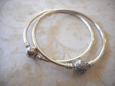 Pair of Narrow Pandora Bangle