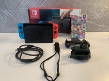 Nintendo Switch + tutti gli accessori originali e Mario Kart 8 deluxe