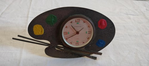 Sveglia tavolo forma di - a,