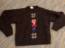 MAGLIONE SCHIACCIANOCI