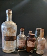 Raro! Lotto 7 flaconi in vetro