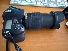 nikon d7100 caricabatteria, obiettivi Nikon 18-105, 70-300 e 50 mm, flash, borsa