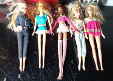 Lotto 18 bambole Barbie e