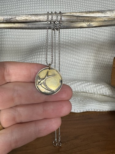 Collana con ciondolo moneta