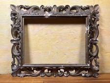 Cornice intagliata in legno