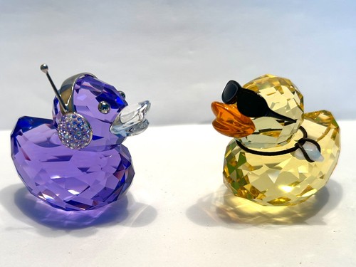 Due statuine swarovski - due,