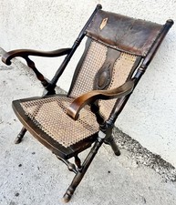 ANTICA POLTRONCINA IN LEGNO LAVORATO E PELLE OTTOCENTESCA DA RESTAURARE