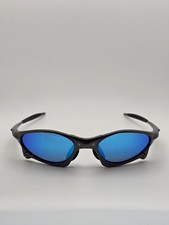 Occhiali da sole Oakley Penny montatura grigia lenti polarizzate blu acqua profonda