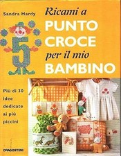 Ricami a punto croce per il