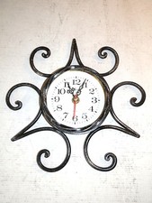 Orologio da parete con movimento al quarzo in ferro battuto con decoro in ferro