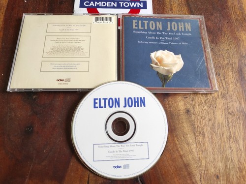 Elton john something about - something,
