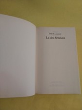 LA DEA BENDATA JOHN T