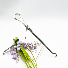 Tiralacci Antico in argento