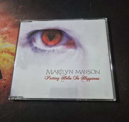 Marilyn manson putting - –,