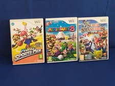 Set 3 Giochi Nintendo Wii Mario Party 8 Mario Sport Mix Super Smash Bros Brawl