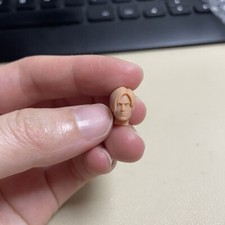 Testa scolpita Scott Kennedy