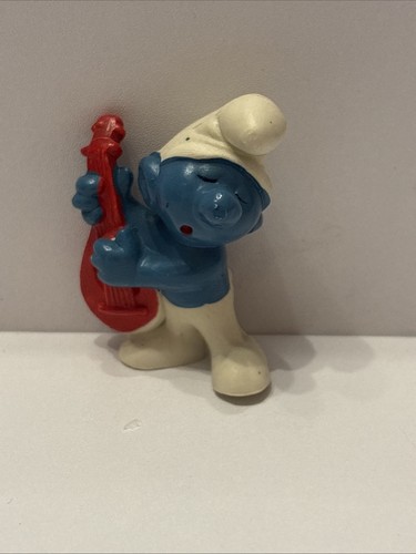 Puffo con mandolino - con,