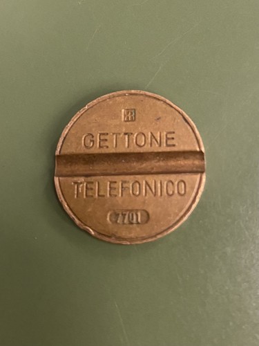 Gettone telefonico con - con, segno