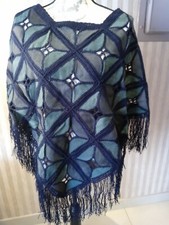 Poncho in pelle artigianale di