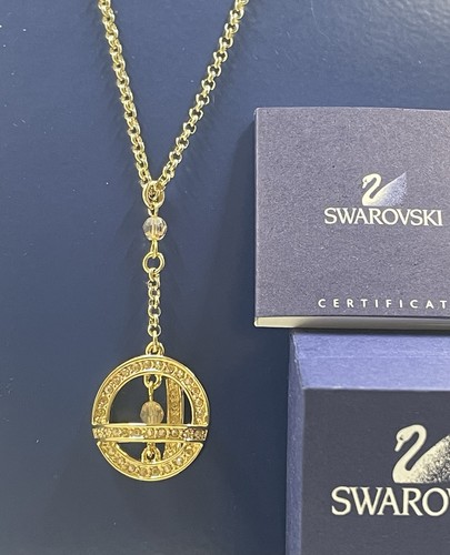 Signed swarovski gold - gold, pendant