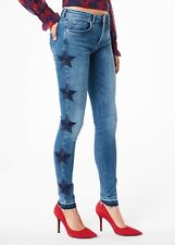 Jeans con stelle ricamate