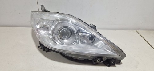 Mazda 2006 droite phare - 5,